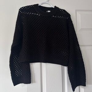Cropped fishnet style sweater with bell sleeves